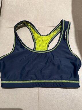 WAVE LIFE WOMEN SIZE XS UPF50+ REVERSIBLE SPORT BRA print and solid navy